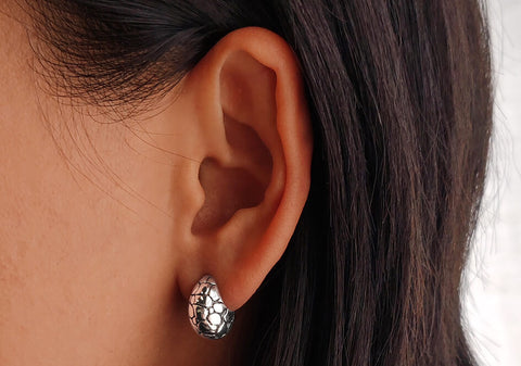 Sterling silver pebble huggie earrings