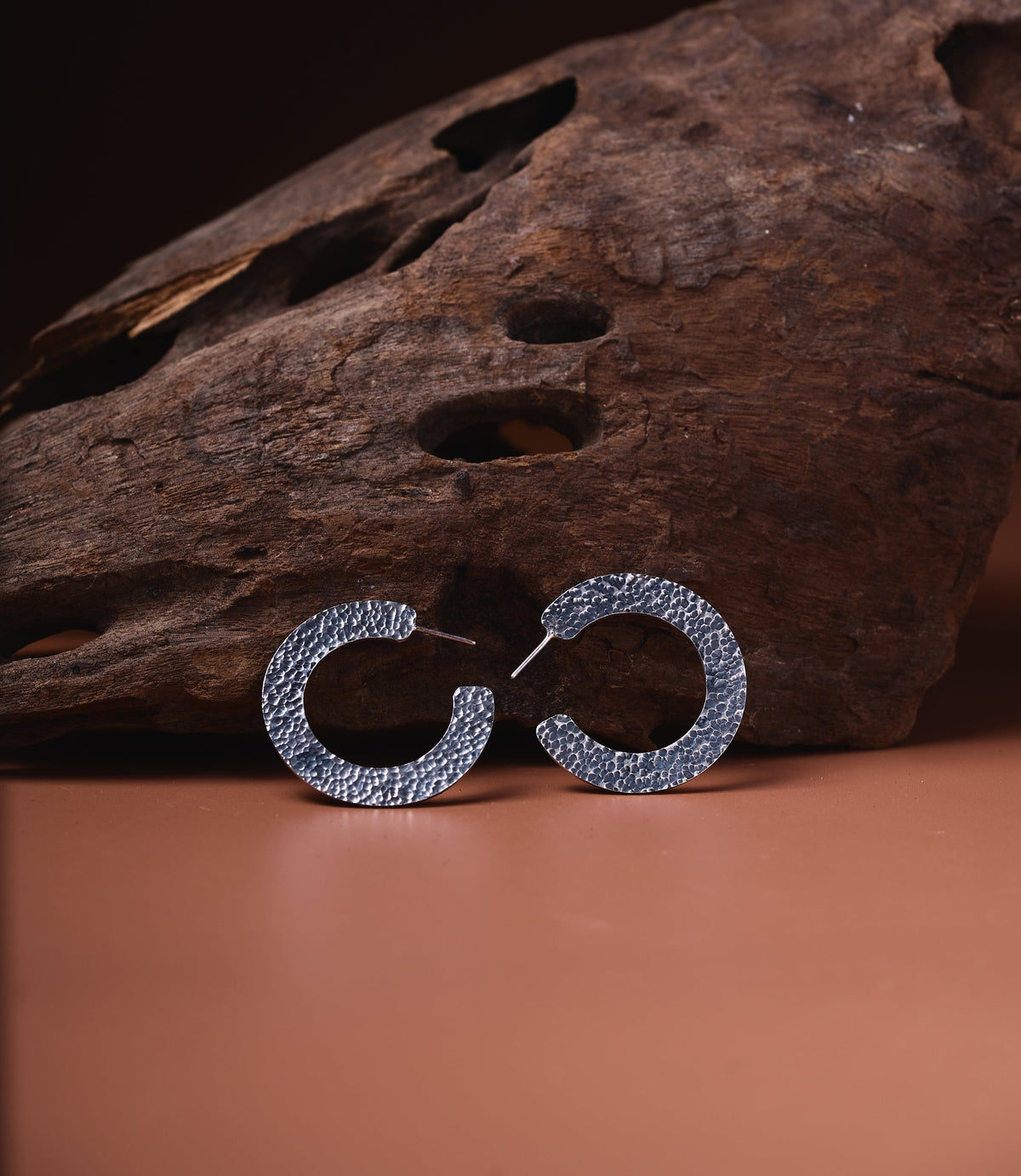 Sienna Hoop Earrings handcrafted in 925 sterling silver featuring a sleek flat hoop design with tribe-inspired detailing.