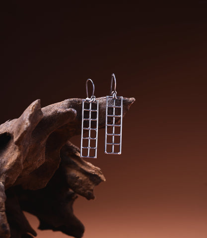 Maeve Wire Earrings handcrafted in 925 sterling silver with a minimalist wire silhouette.