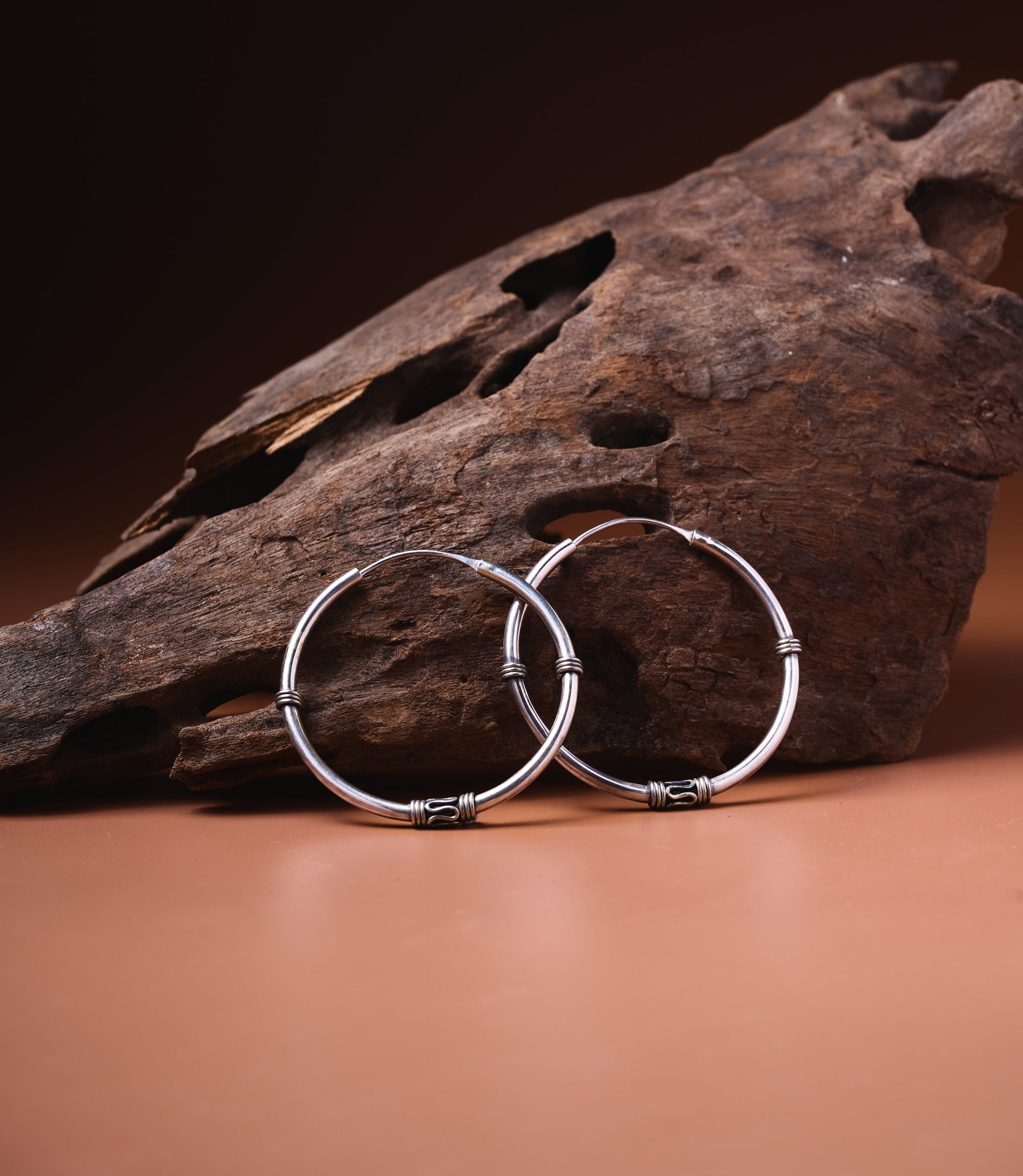 Nina Earrings in 925 sterling silver showing thick large classic hoop design.