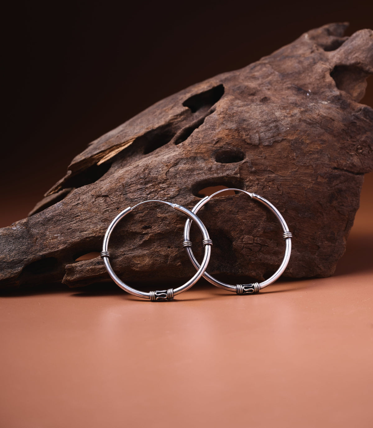 Nina Earrings in 925 sterling silver showing thick large classic hoop design.