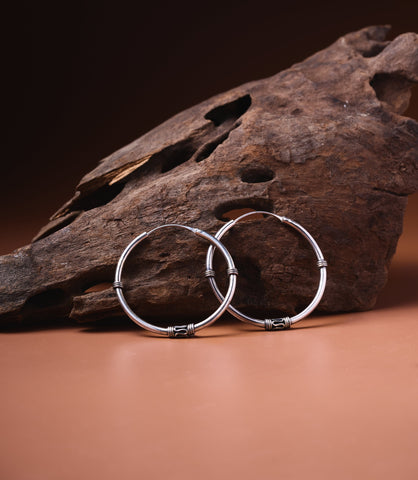 Nina Earrings in 925 sterling silver showing thick large classic hoop design.