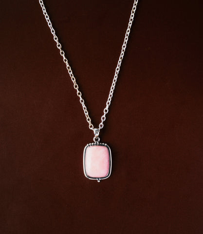 The Elodie Necklace in 925 sterling silver featuring a soft pink opal pendant with a smooth polished finish.