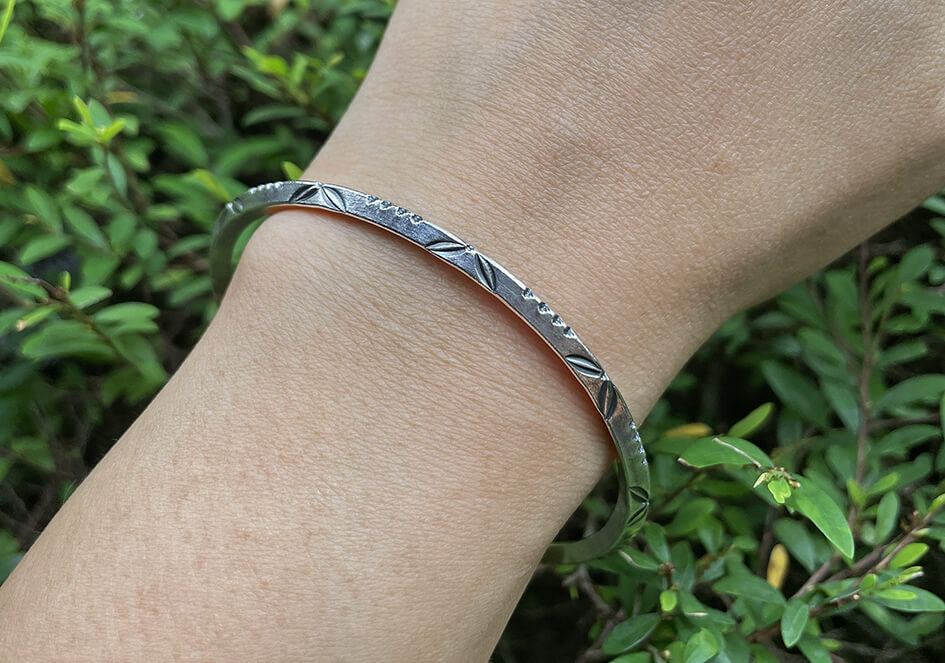 Minimalist stamped leaf triangle silver bangle