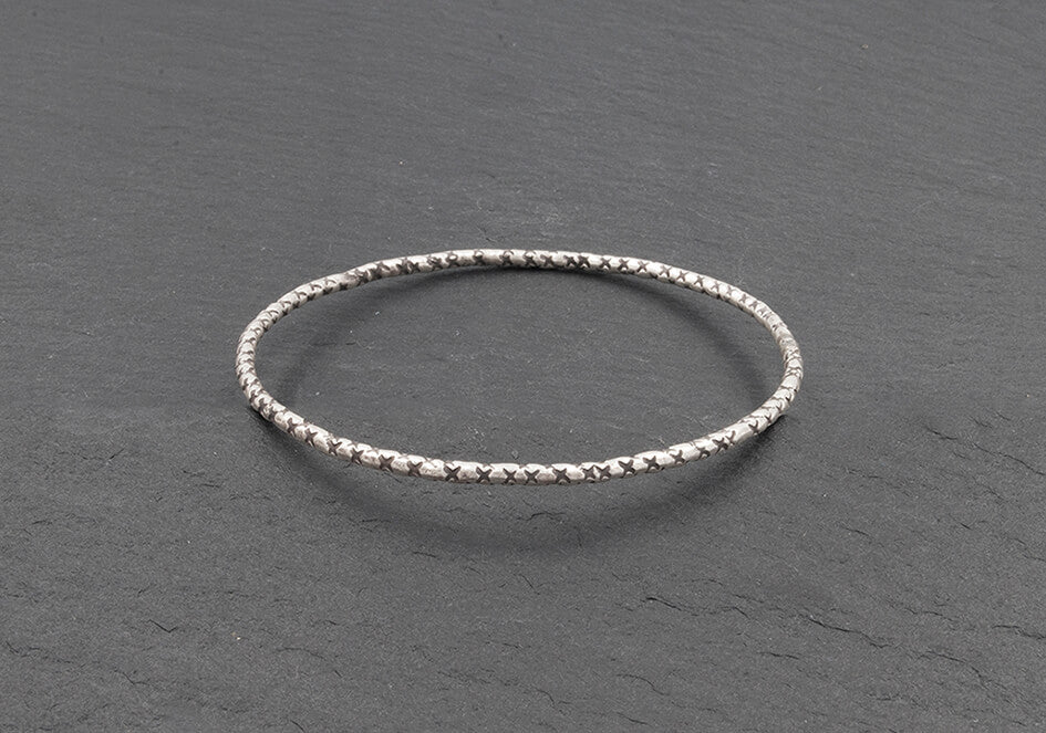 Minimalist circle silver bangle with stamped details