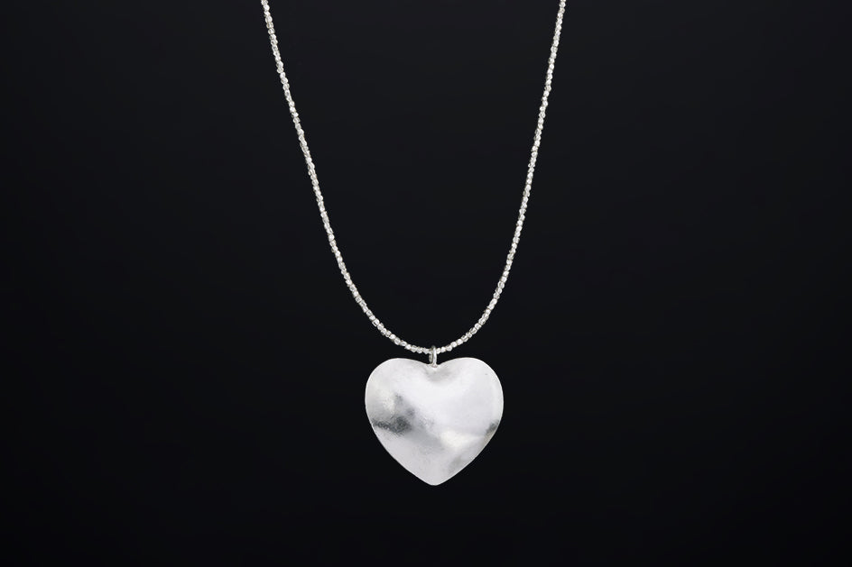 Handcrafted pure silver heart necklace with oversized pendant and polished finish