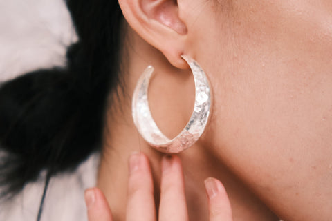 Helena Hoop pure silver earrings worn as a statement accessory for an elevated evening look