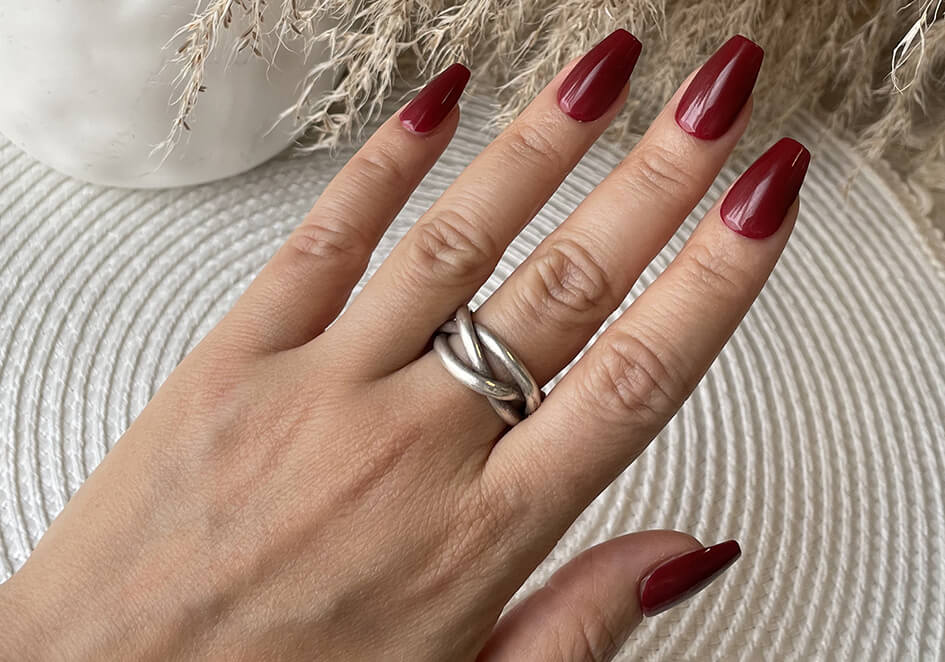 Model wearing Taylor Ring, a sculptural pure silver ring for everyday styling.