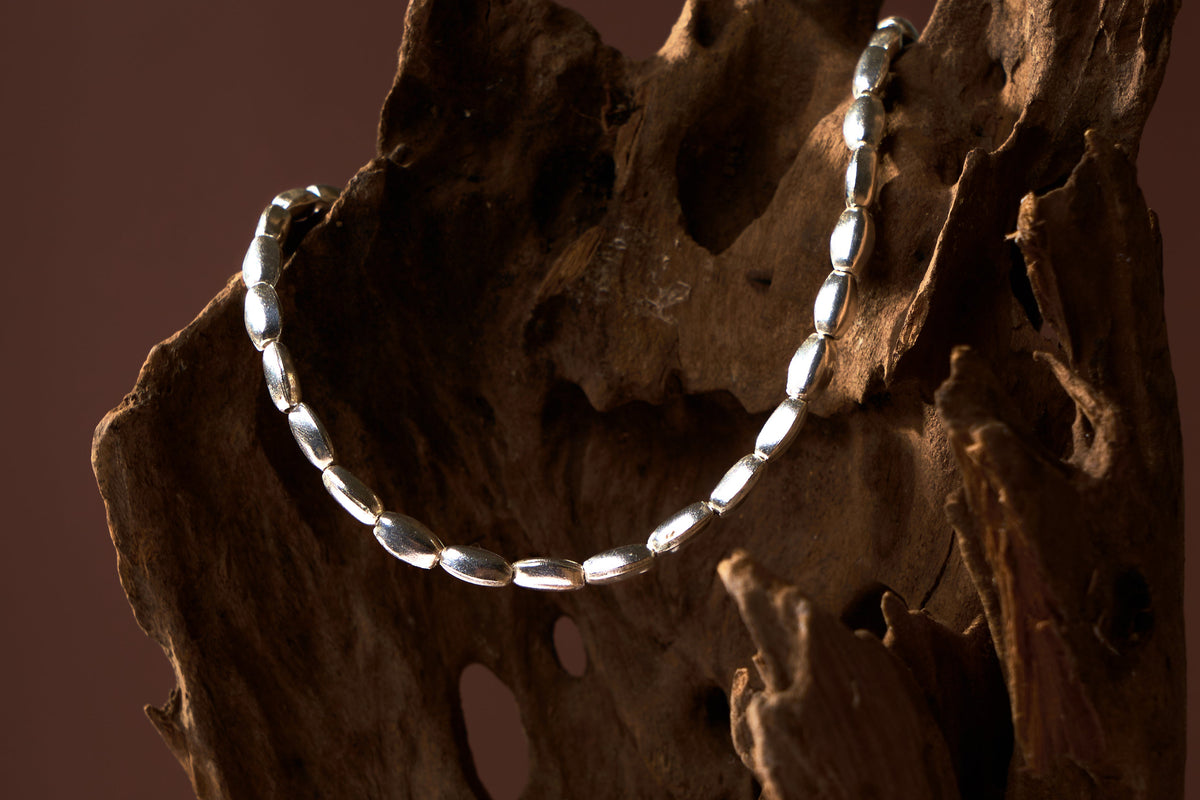 Andrea Necklace in pure silver with thick rice-shaped beads by Hill To Street