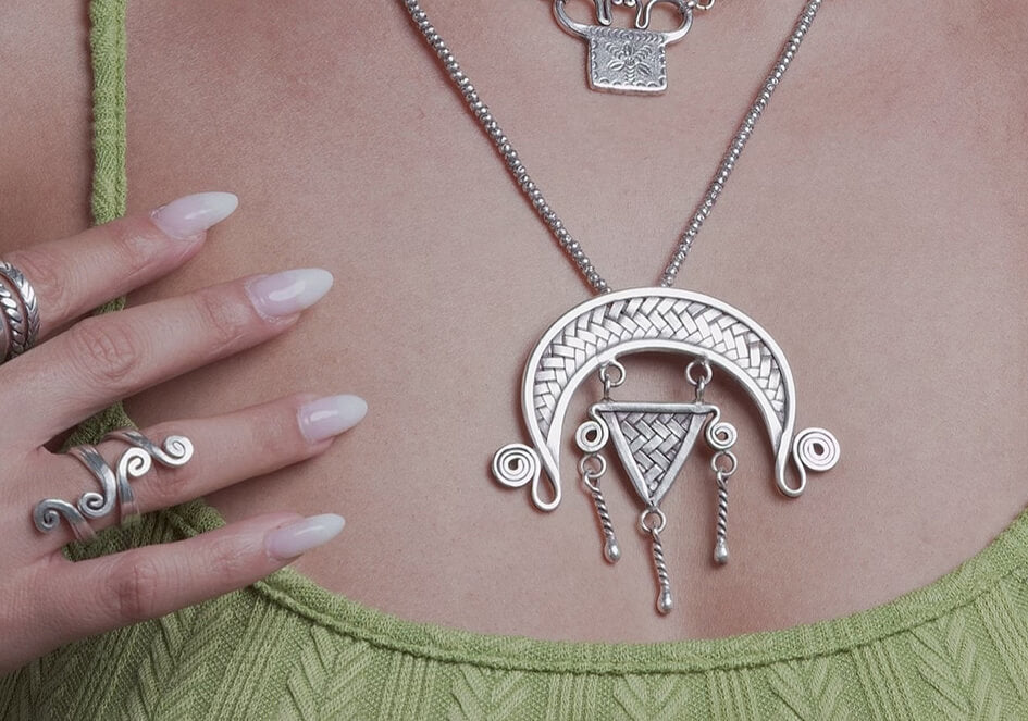 Anong Pure Silver Tribal Necklace worn at the neckline, styled over a plain top for a bold artisan statement look