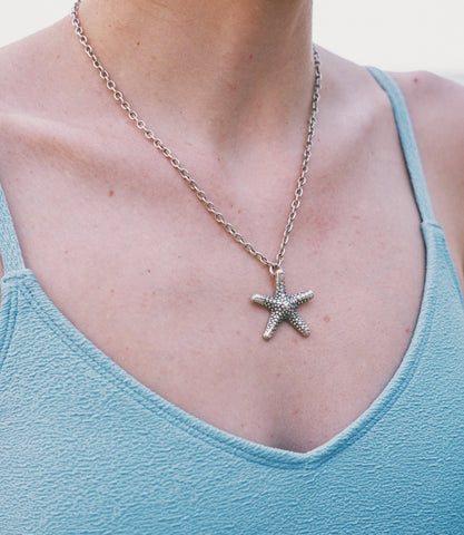 Model wearing Chloe Necklace, a coastal-inspired pure silver choker necklace for everyday styling.