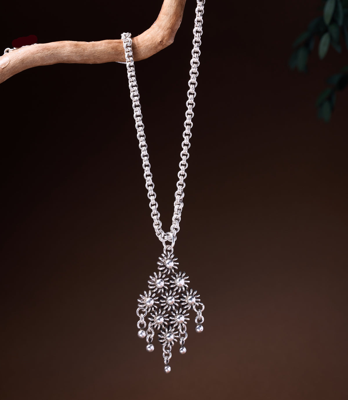 Florina Necklace with cascading daisy cluster pendant on a rolo chain
