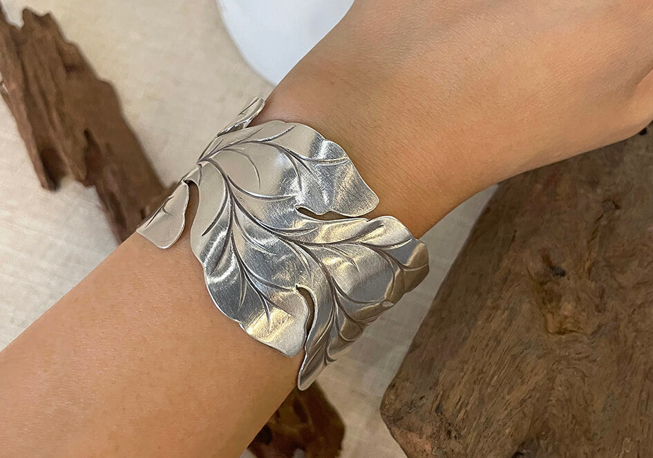 Model wearing Hannah Statement Cuff, a nature-inspired pure silver bracelet for everyday styling.