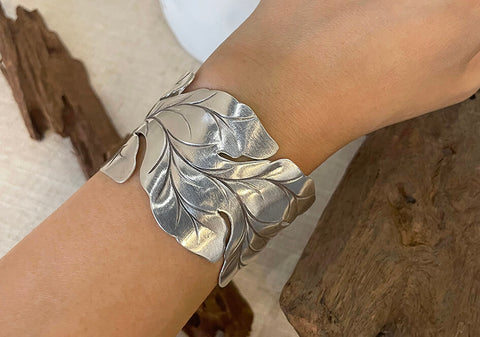 Model wearing Hannah Statement Cuff, a nature-inspired pure silver bracelet for everyday styling.