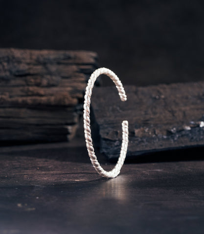 Handcrafted pure silver bangle with an open-ended design from Hill to Street jewellery brand