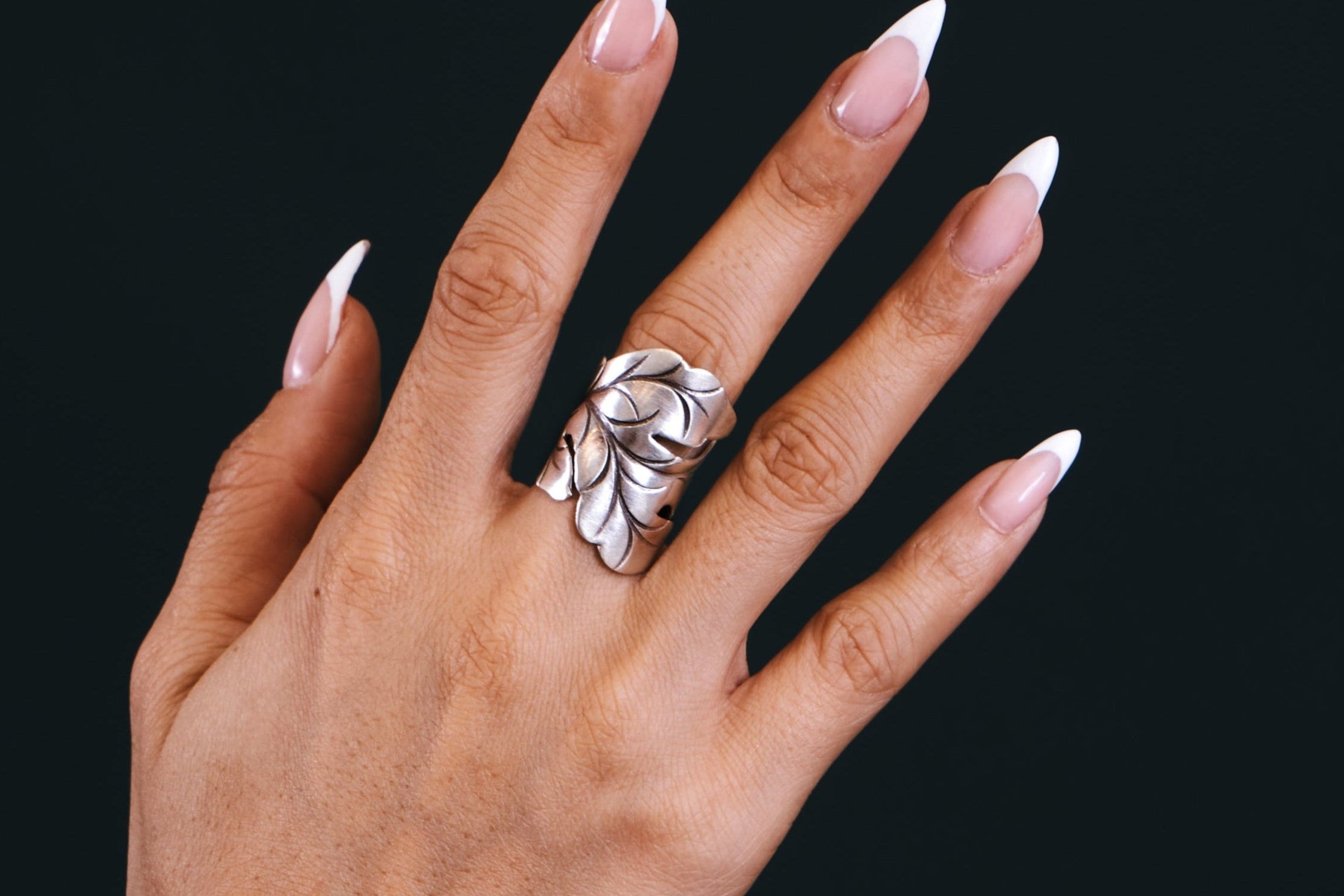 Model wearing Anaya Ring, a nature-inspired pure silver ring for everyday styling.