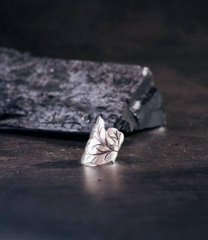 Anaya Ring in pure silver showing a wraparound leaf design curving around the finger.
