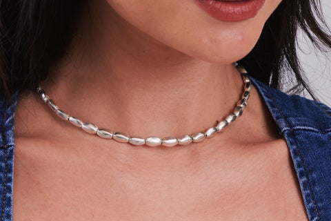 Andrea pure silver beaded necklace worn layered over a relaxed everyday outfit