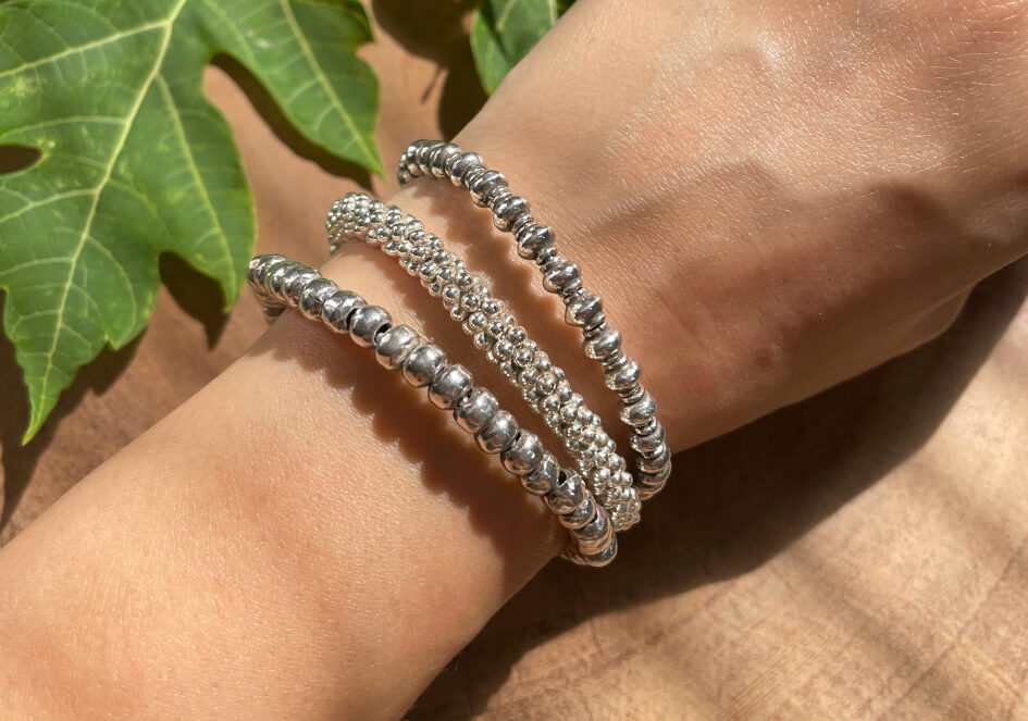 Anyi Bracelet worn on the wrist, styled solo as a statement piece with casual everyday outfit