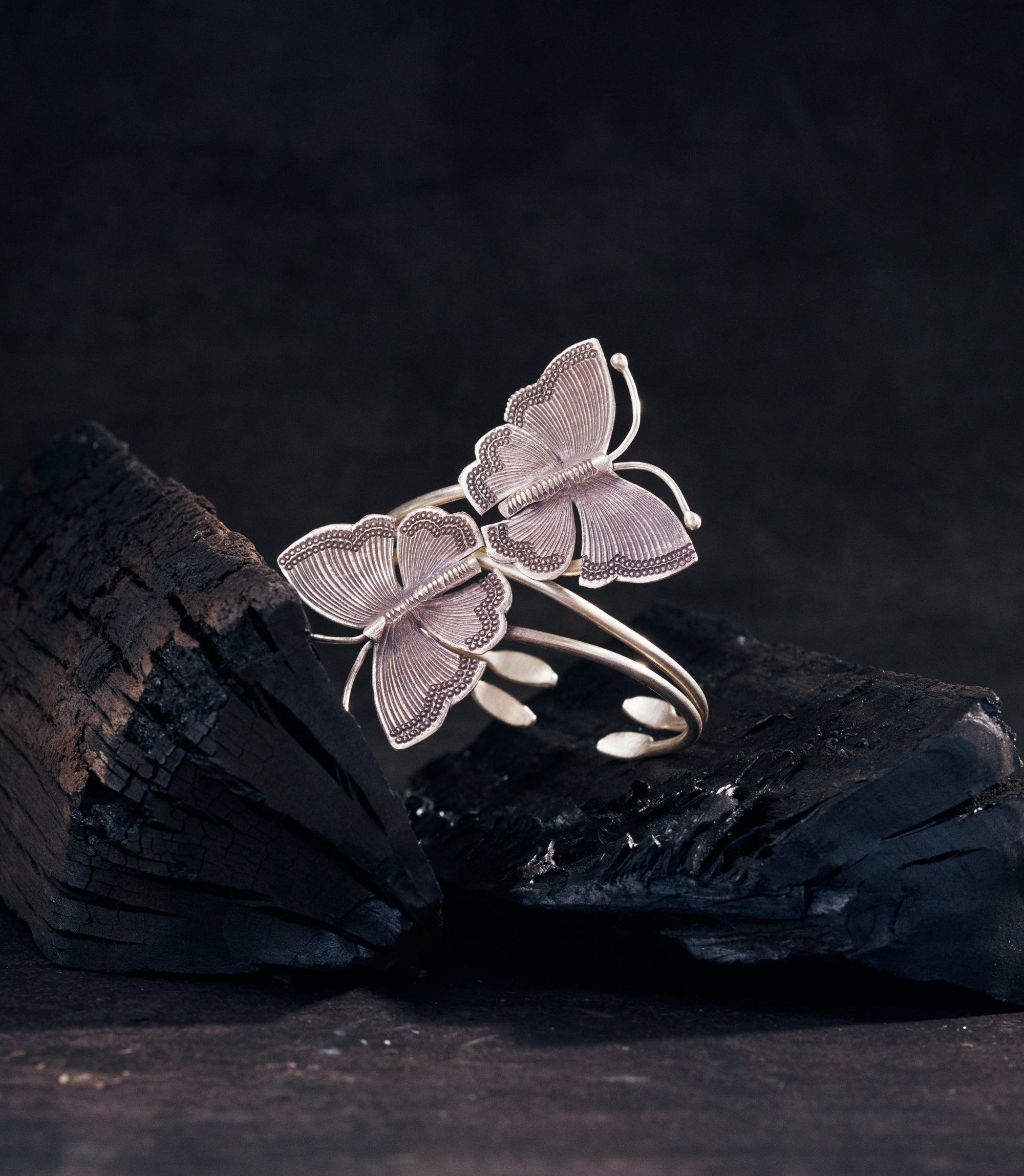 Calista Bangle in pure silver — open cuff bracelet with two sculpted butterflies, handcrafted by Hill to Street