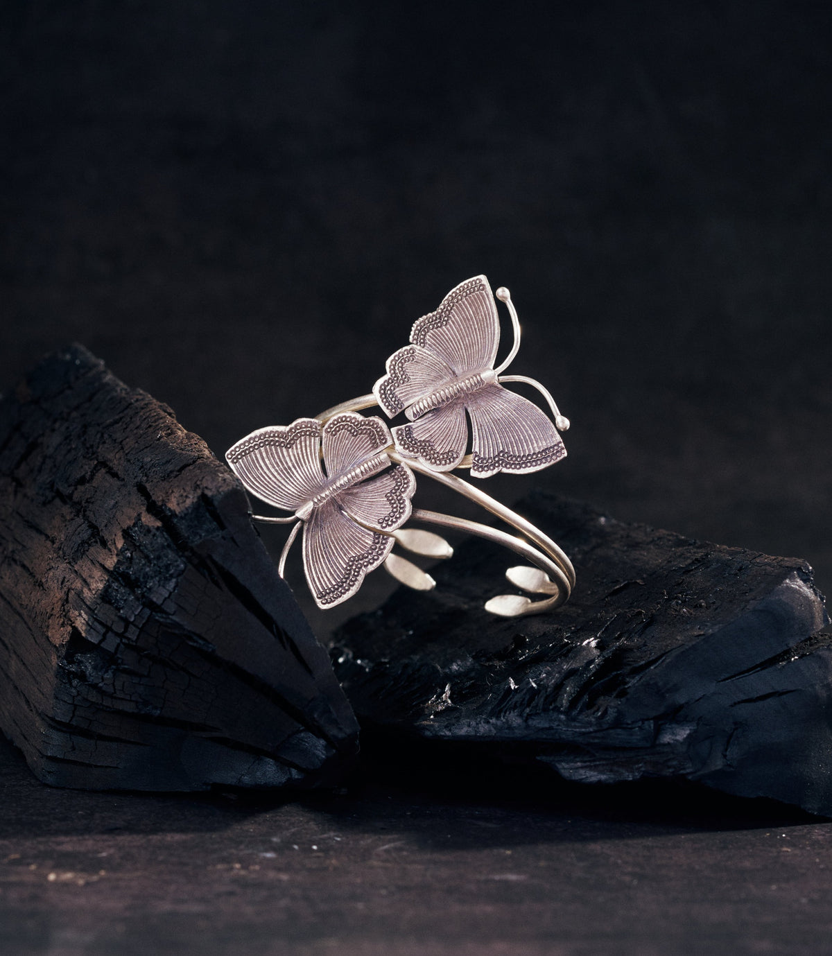 Calista Bangle in pure silver — open cuff bracelet with two sculpted butterflies, handcrafted by Hill to Street