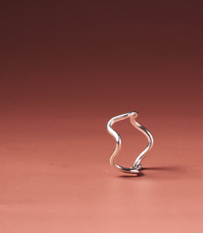 Celeste Pure Silver Wave Ring handcrafted from pure silver wire with a fluid wavy silhouette, front view