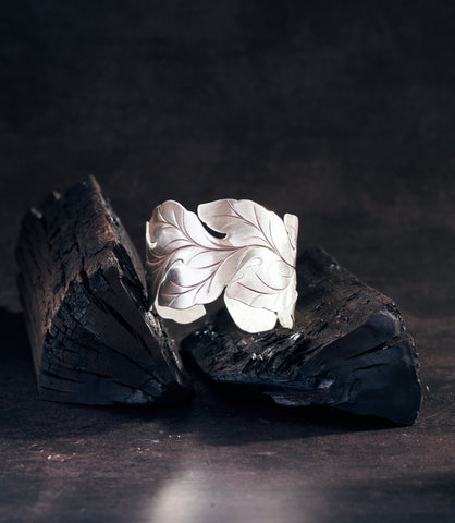 Hannah Statement Bangle in pure silver with hand-carved asymmetrical leaf design, handcrafted by Hill to Street