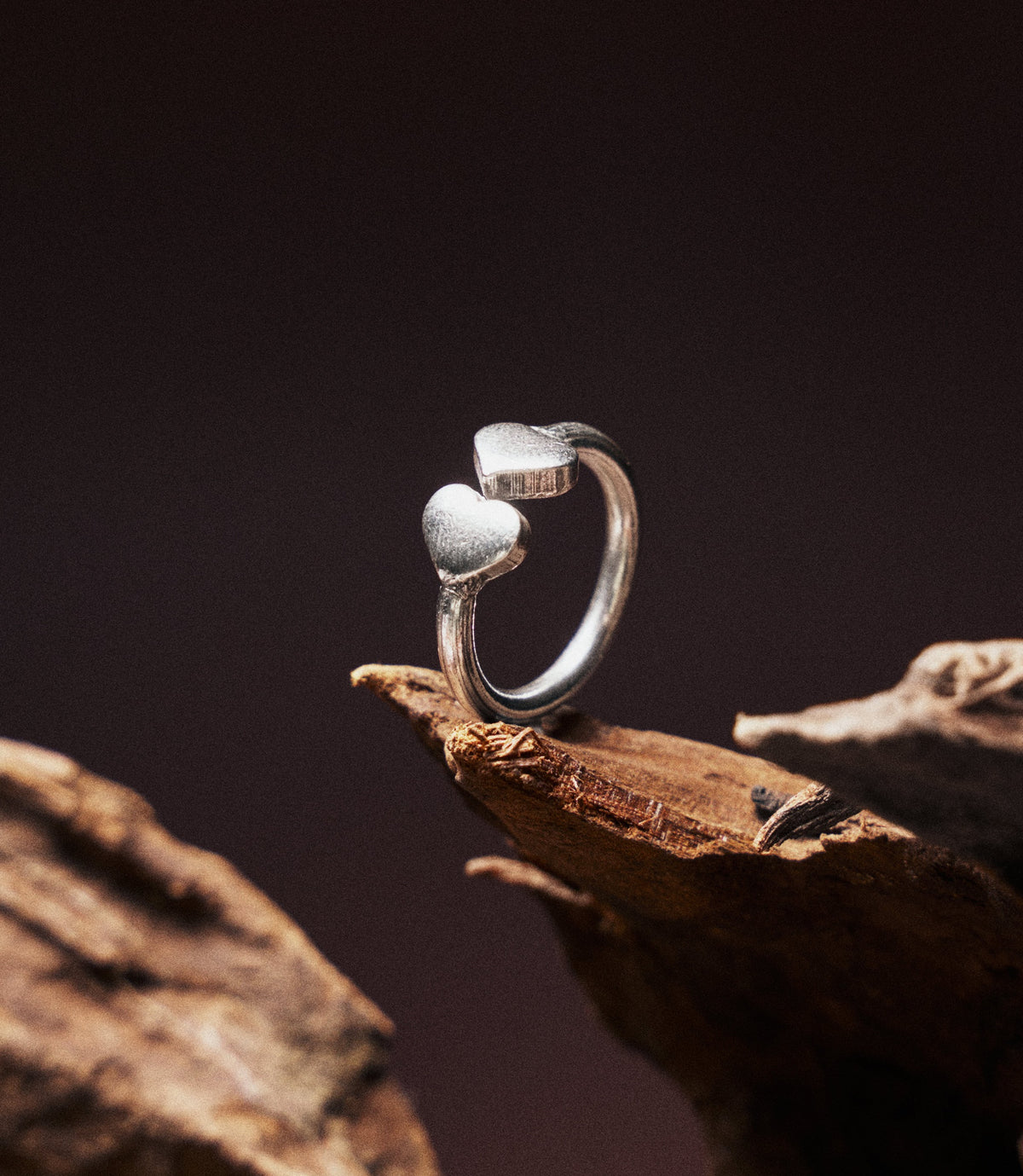Jill Hear Ring in pure silver with tiny dangling heart charms, full product view
