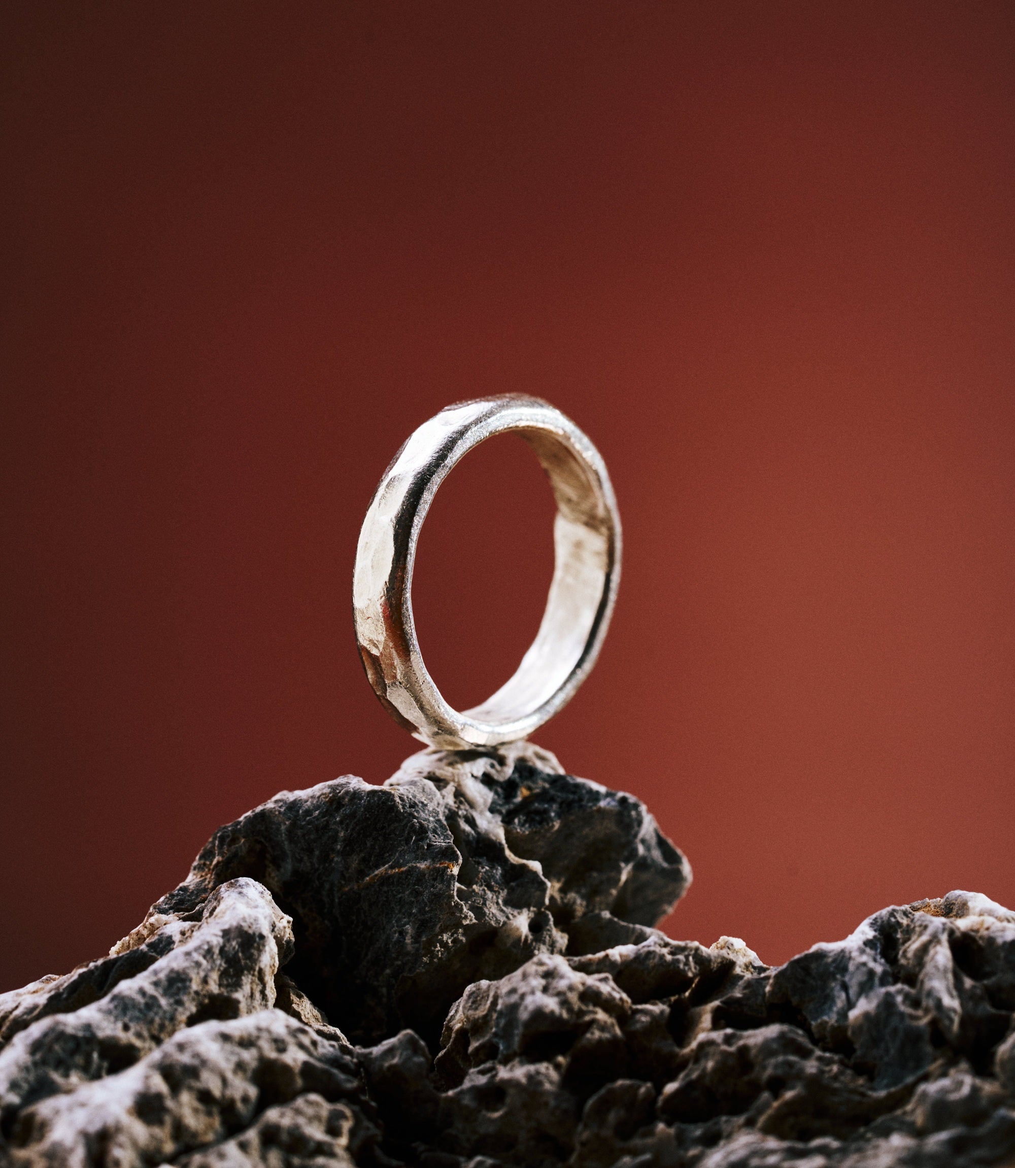 Kerry ring in pure silver showing a hand-hammered textured surface.