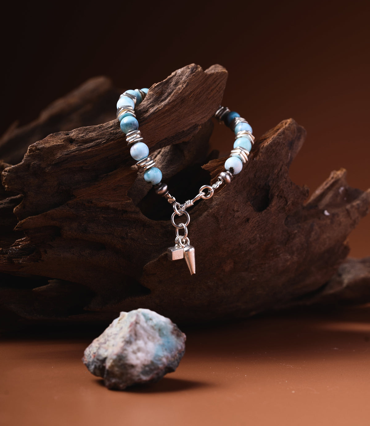 Lara Larimar Bracelet with pure silver disc beads and geometric cube and spike charm drop