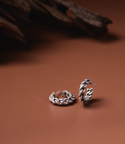 Lila Pure Silver Twist Hoops showing braided rope texture detail on both earrings