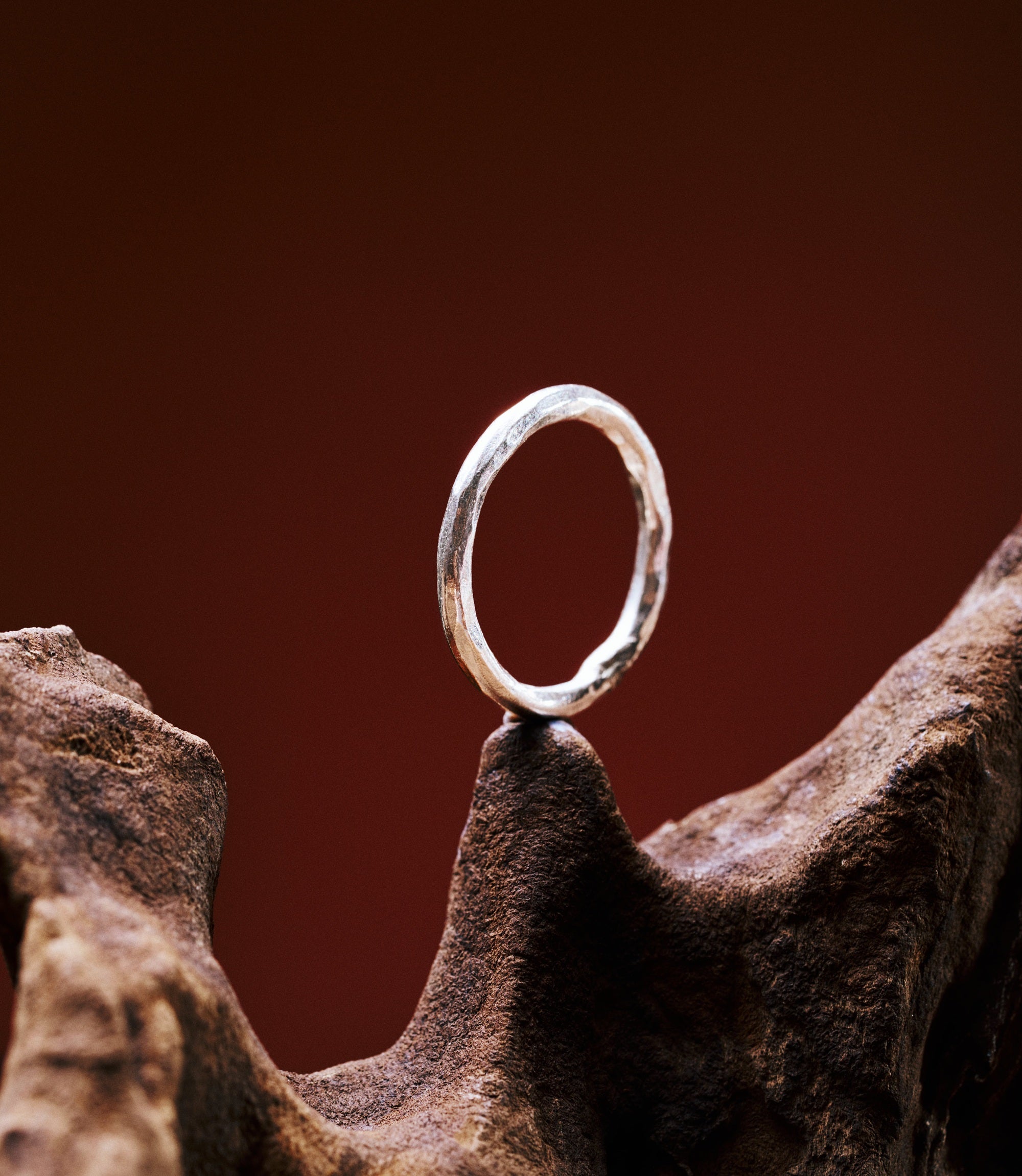 Hill to Street Lume Ring, a minimalist pure silver hammered band ring