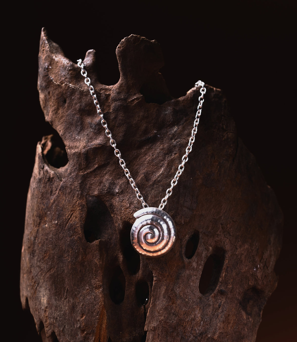 Nerida Necklace in pure silver showing a handcrafted spiral pendant on a fine silver beaded chain.