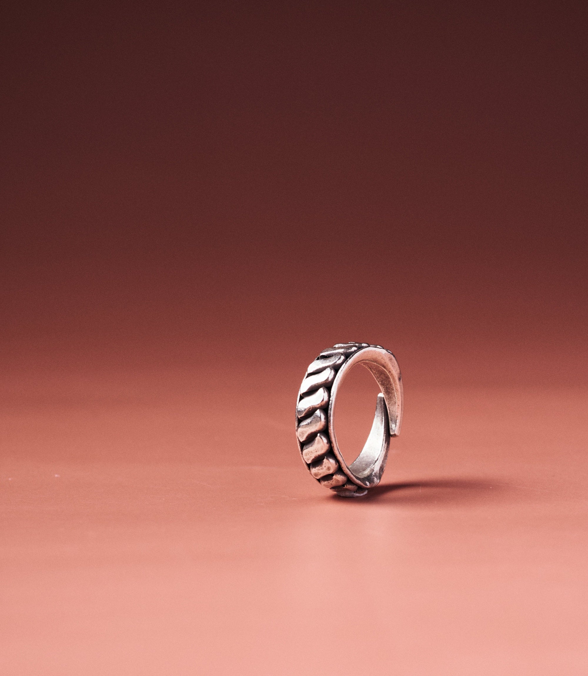 Noelle Pure Silver Twisted Texture Ring, handcrafted open-band ring with bold intersecting ridges in pure silver