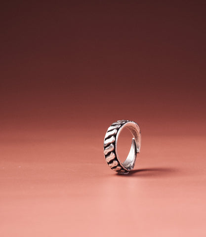 Noelle Pure Silver Twisted Texture Ring, handcrafted open-band ring with bold intersecting ridges in pure silver