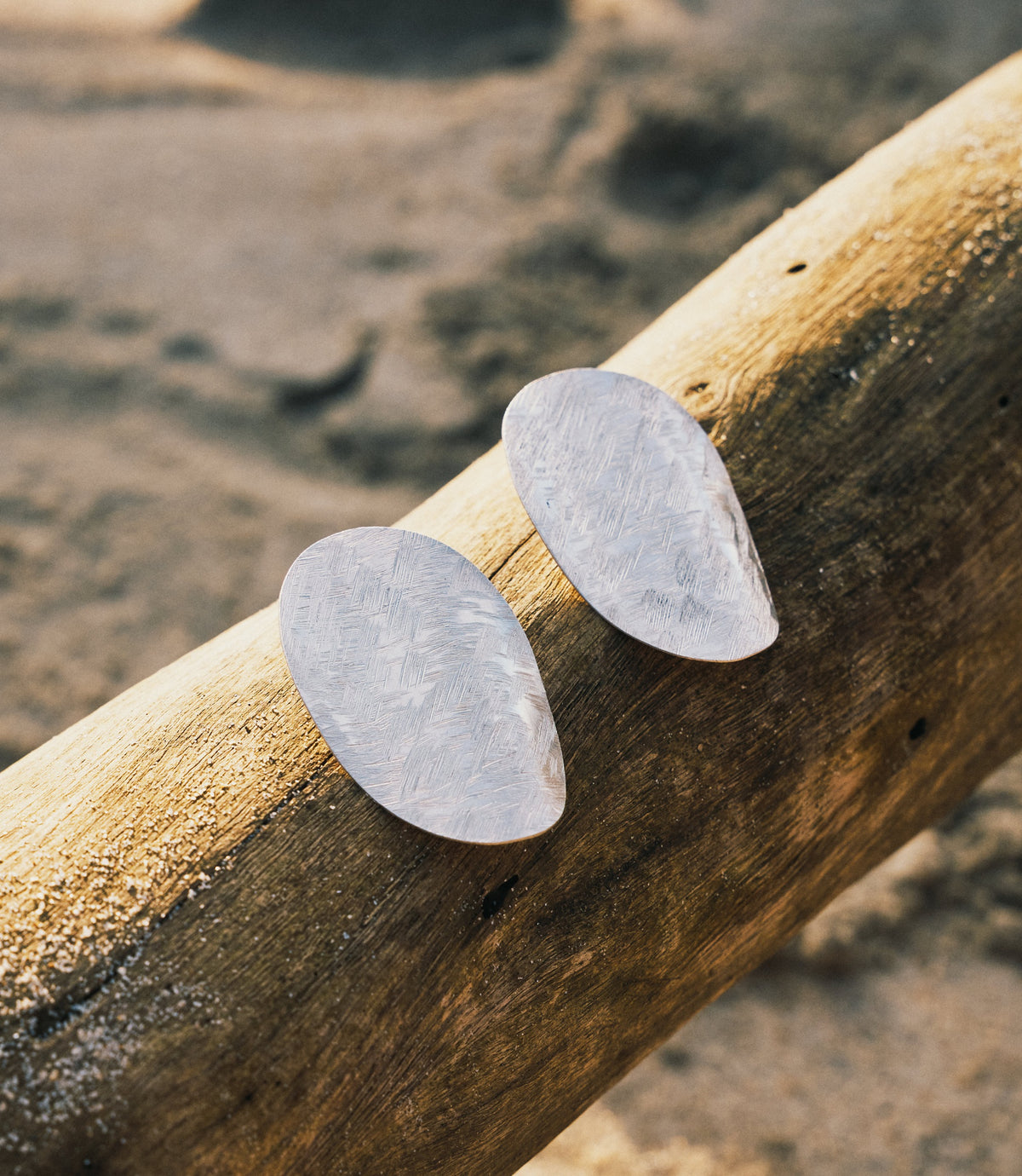 Novie Earrings — oversized pure silver stud earrings with matte brushed finish, handcrafted by Hill to Street