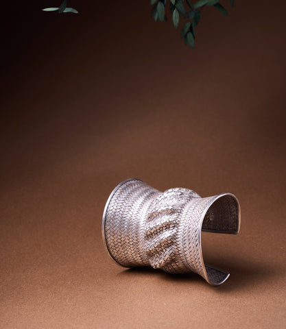 Solenne Pure Silver Woven Cuff, wide Hill Tribe pure silver basketweave statement cuff bracelet on brown background