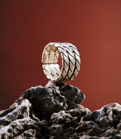Trinity Silver Ring in pure silver showing three twisted bands soldered into one adjustable ring.