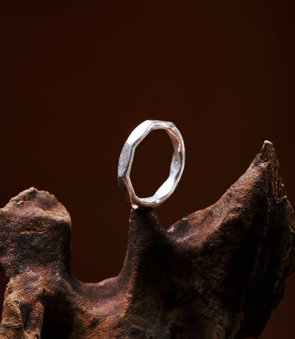 Venn Ring in pure silver showing a smooth organic curve and lightly hammered surface.