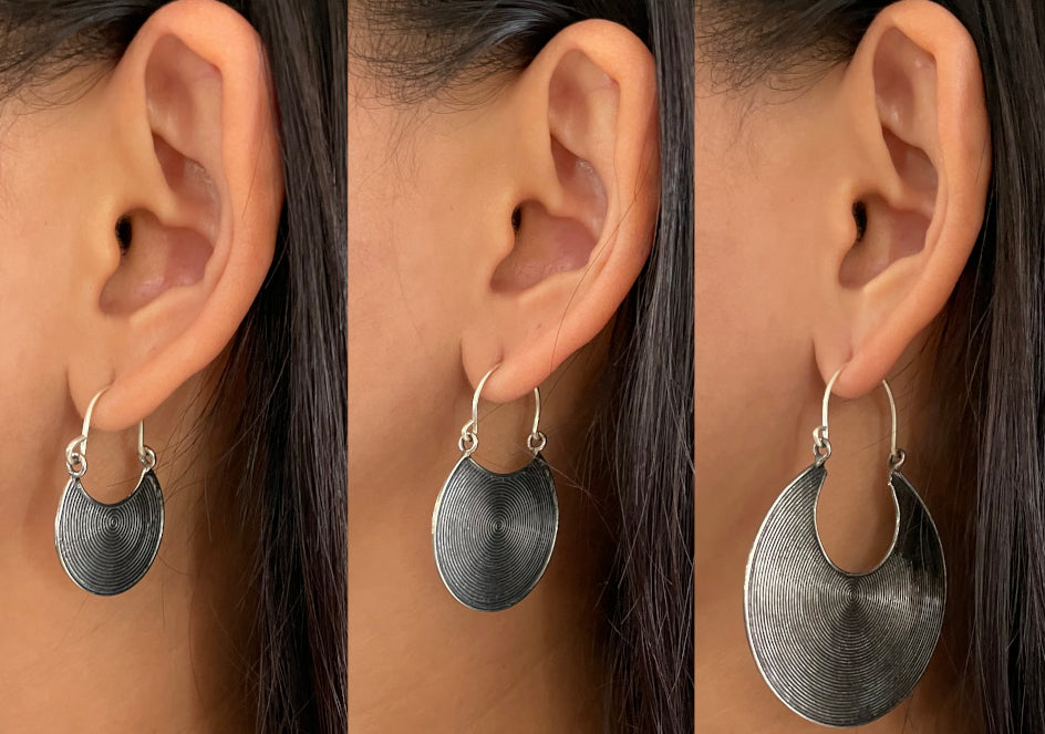 Tribal disc statement earrings