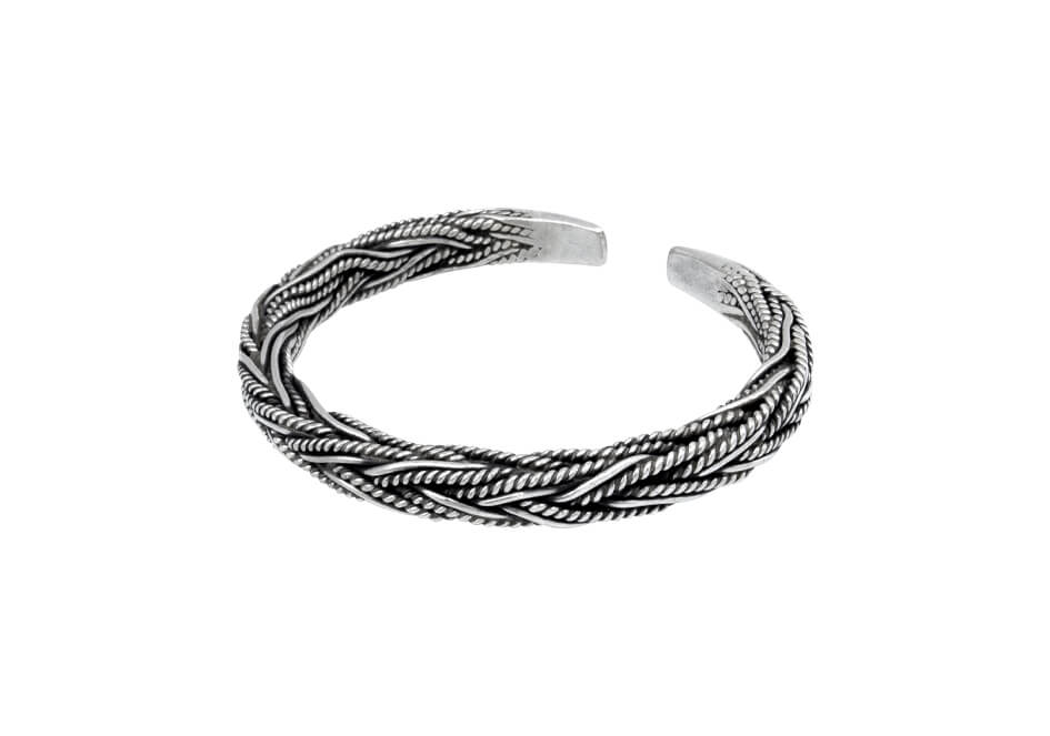 Braided silver cuff bangle from Hill to Street over a white background