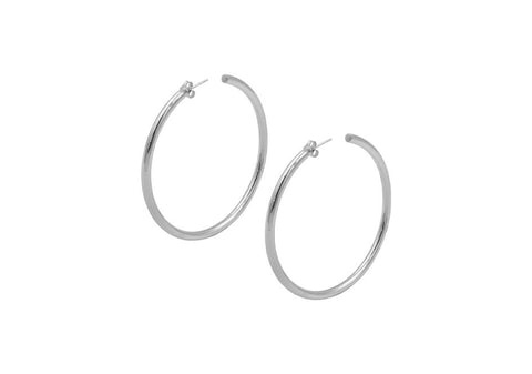 Classic large thick hoops over white background