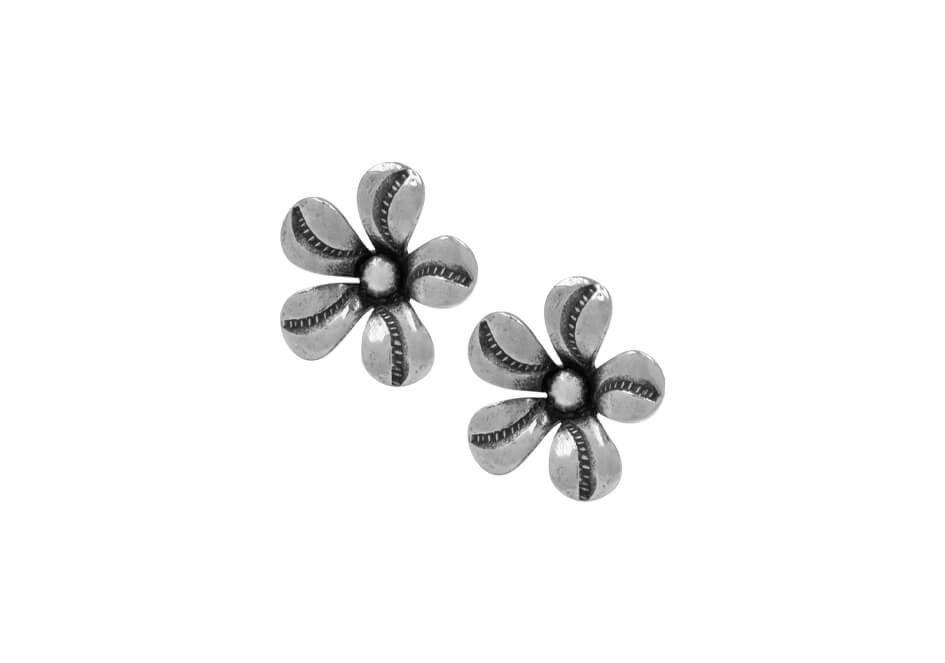 Pair of fleur silver stud earrings from Hill to Street over a white background