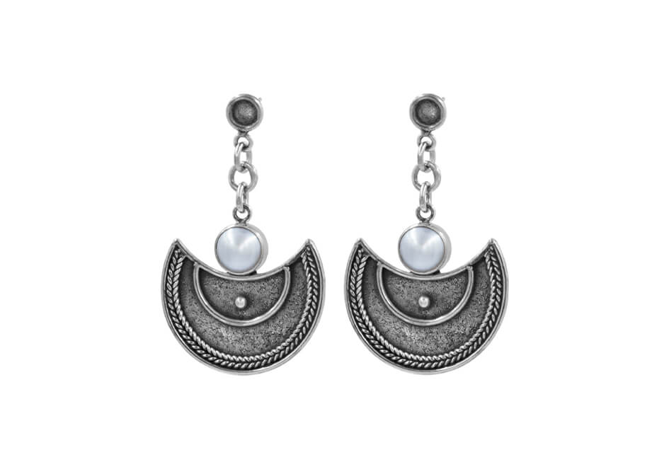 Pair of half circle sterling silver dangle earrings with pearls over a white background