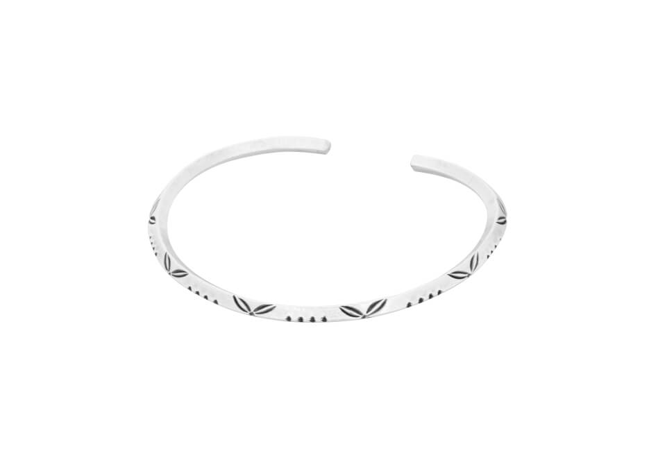 Minimalist stamped leaf triangle silver bangle from Hill to Street over a white background