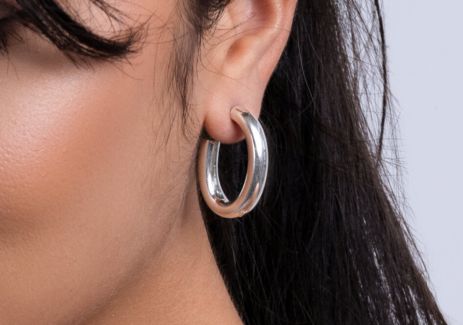 Oval silver hoop earrings
