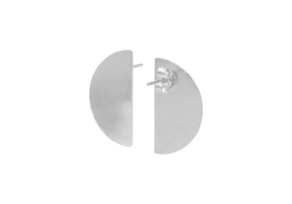 Semi-circle silver stud earrings over white background