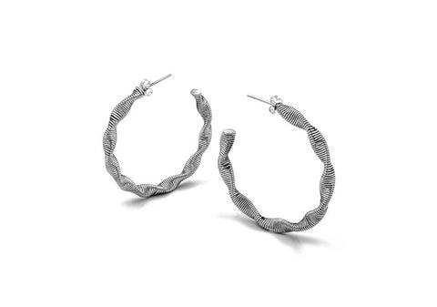 Silver hoops with a twist