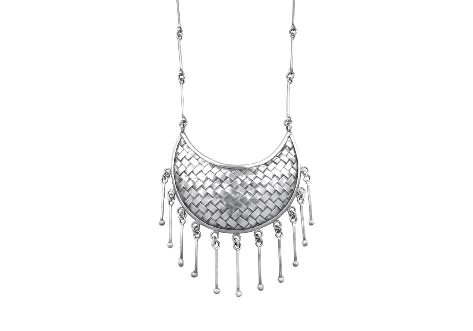Tribal statement silver necklace from Hill to Street over a white background