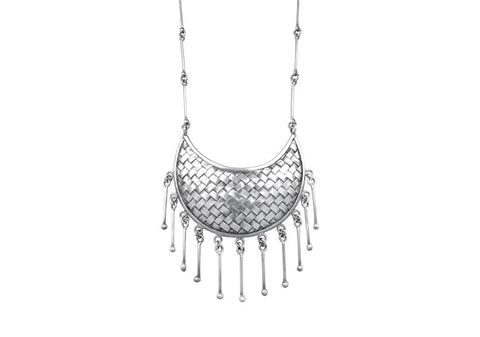 Tribal statement silver necklace from Hill to Street over a white background